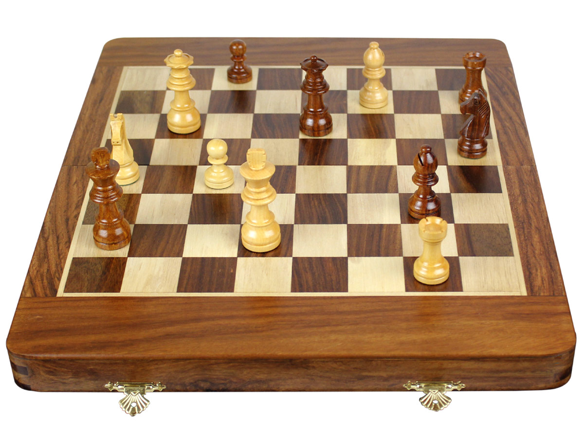 Front view of fully open chess board with pieces
