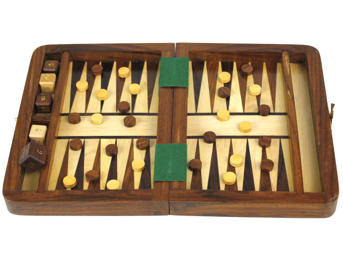 Fully open backgammon board with checkers and dice