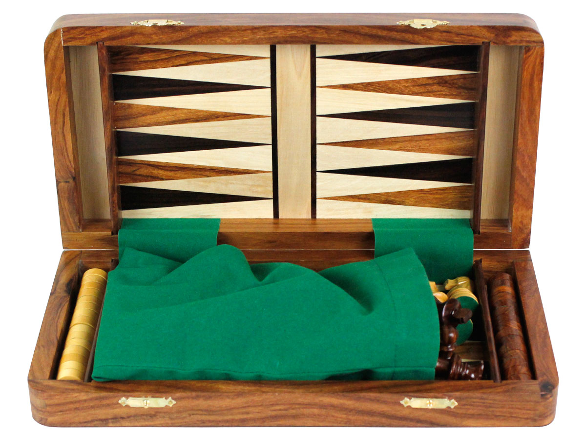 Chess pieces packed in green velvet cloth with checkers in place