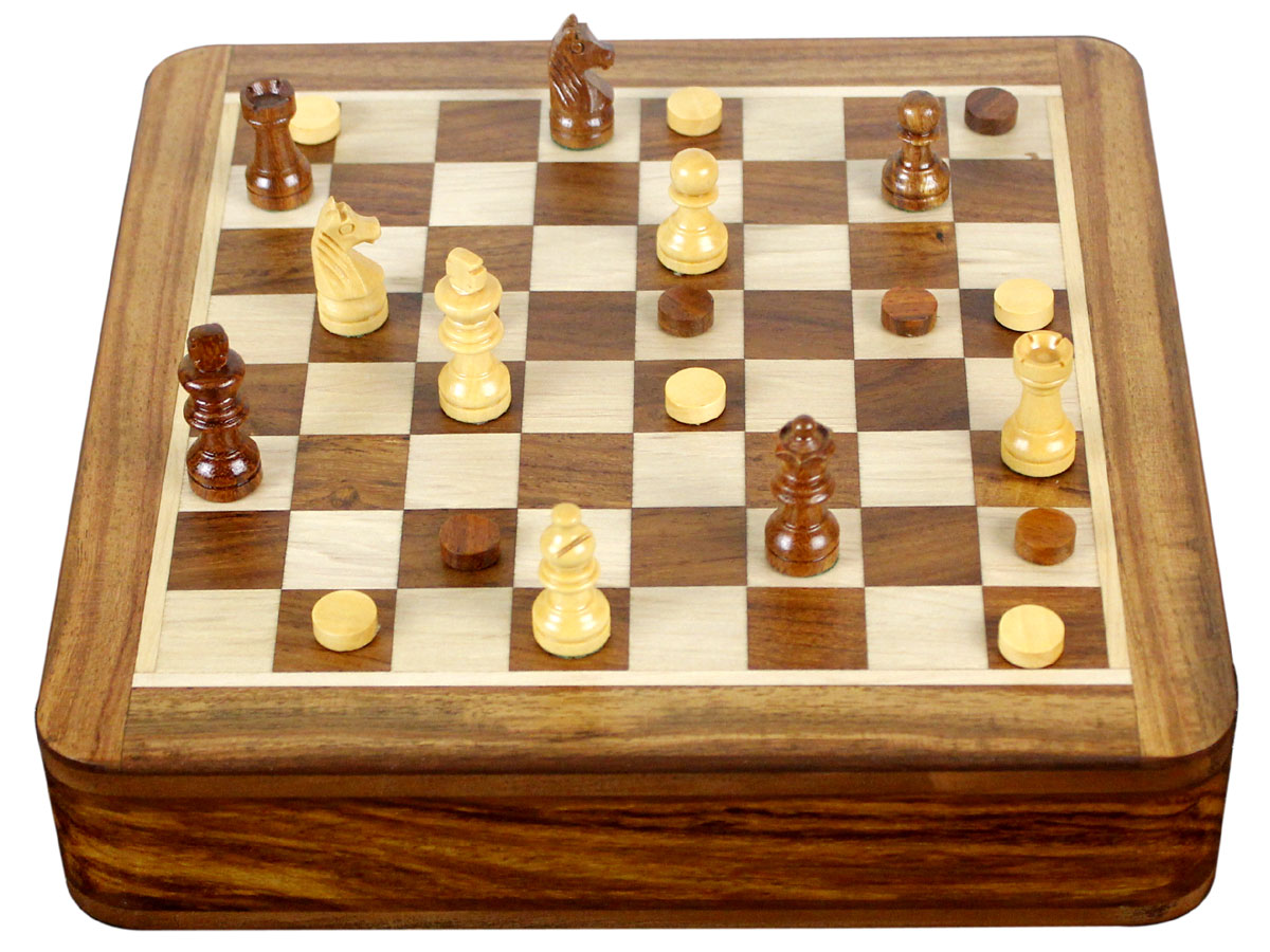 Closed view of chess set combo with checkers and pieces on top