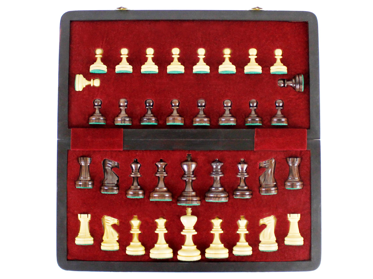 Inner view of chess box and pieces in its place