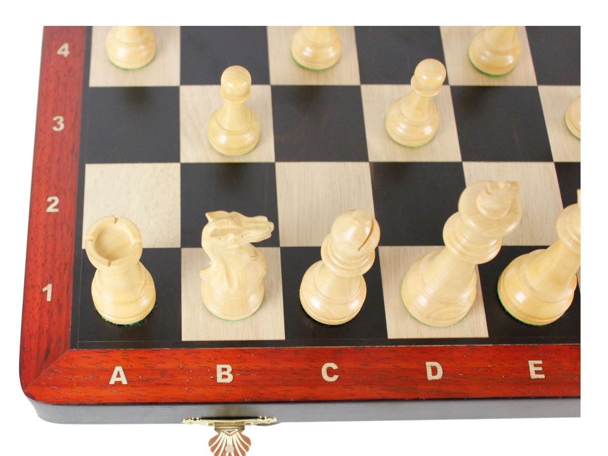 Close up view of inlaid wooden algebraic notations