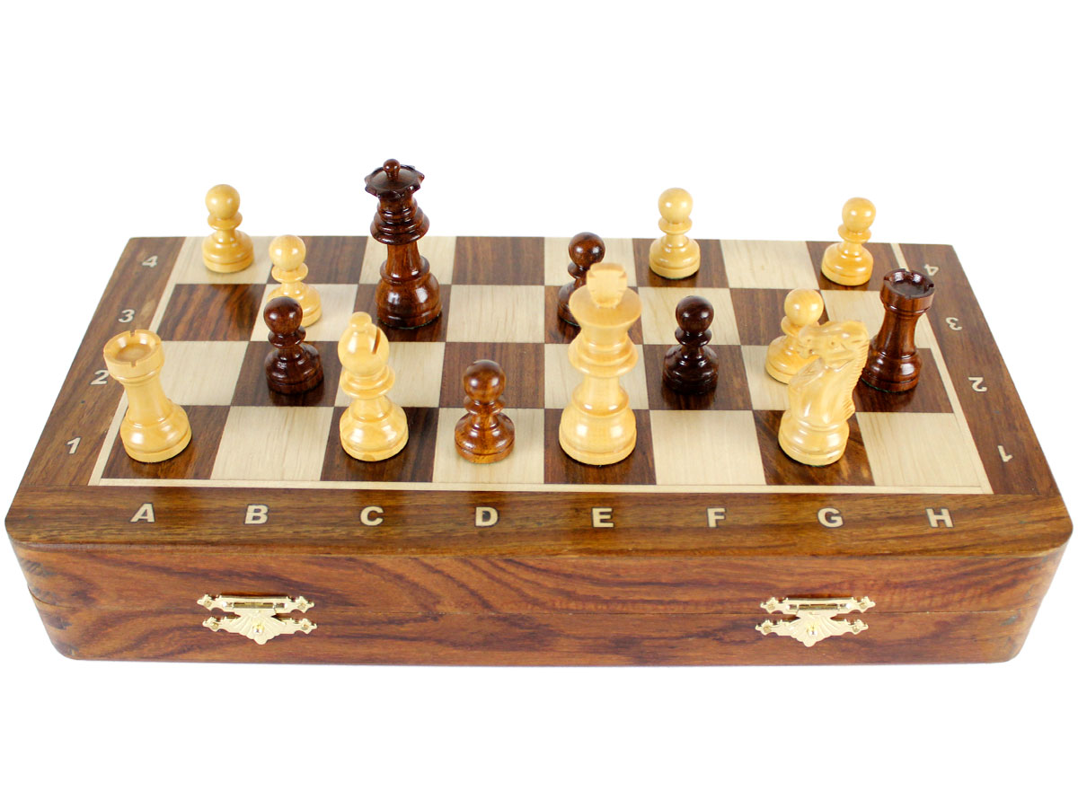 Folded front view of chess board with pieces