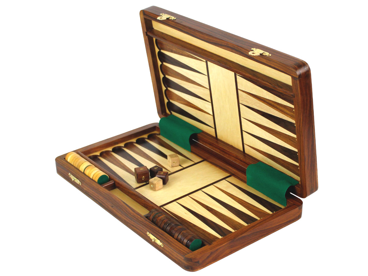 Side view of backgammon with checkers and dice in place