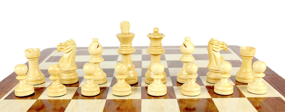 Boxwood Chess Pieces on the Chess board
