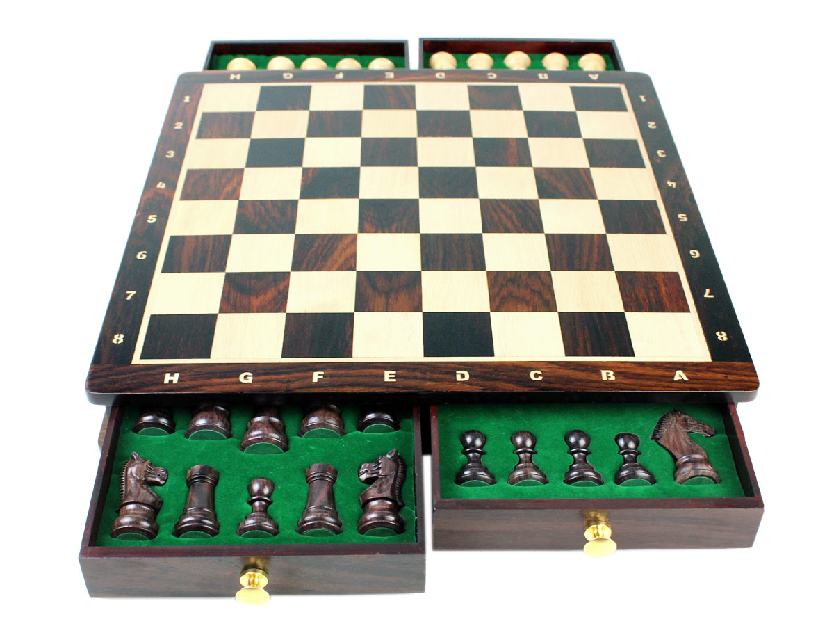 Galaxy Staunton Chess pieces placed in foam cut out inserts