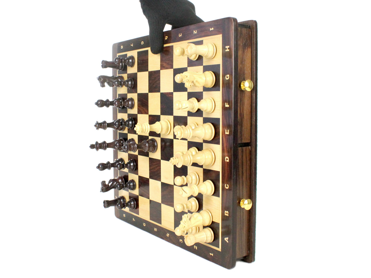 Strong magnets do not let the chess pieces fall down even if the board is kept in vertical position