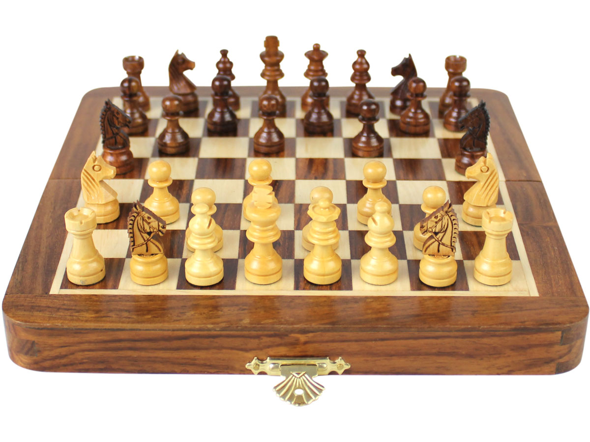 Flat layout of chess board with pieces on top