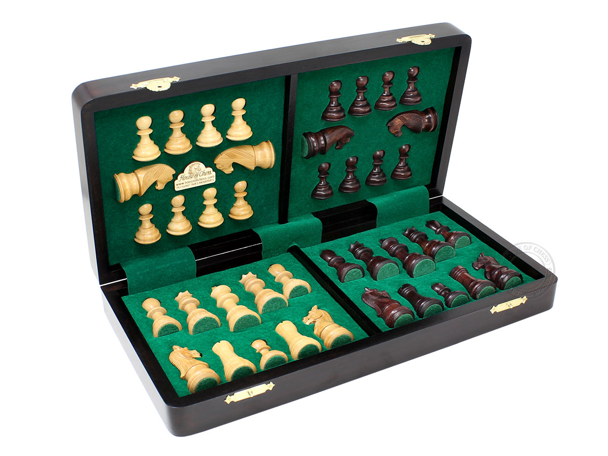Chess pieces fitted in special inserts made according to the shape of the chess pieces