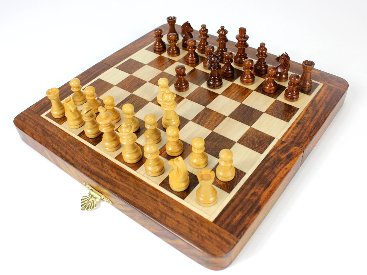 Flat layout of chess board with pieces on top