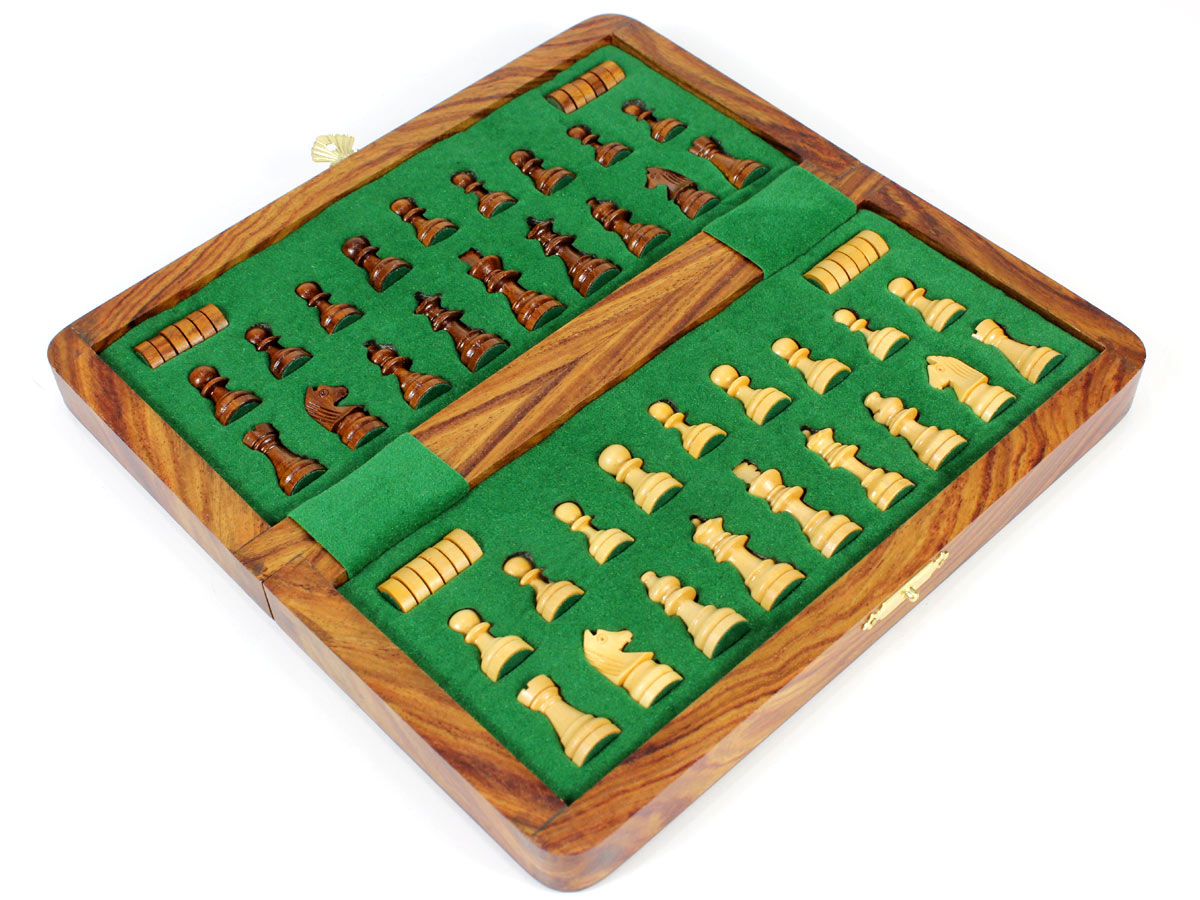 Inner view of chess box with pieces and checkers inserted
