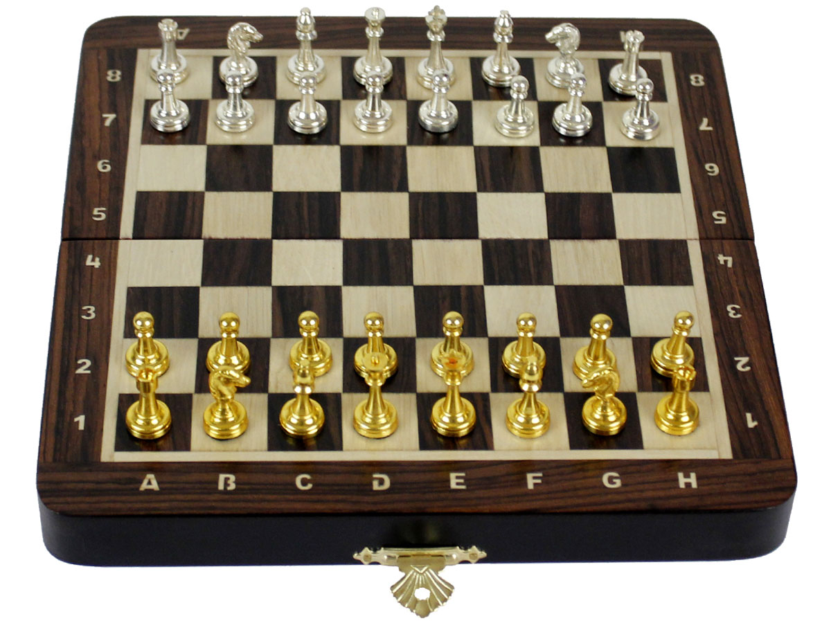 Flat layout of chess board with metal pieces on top