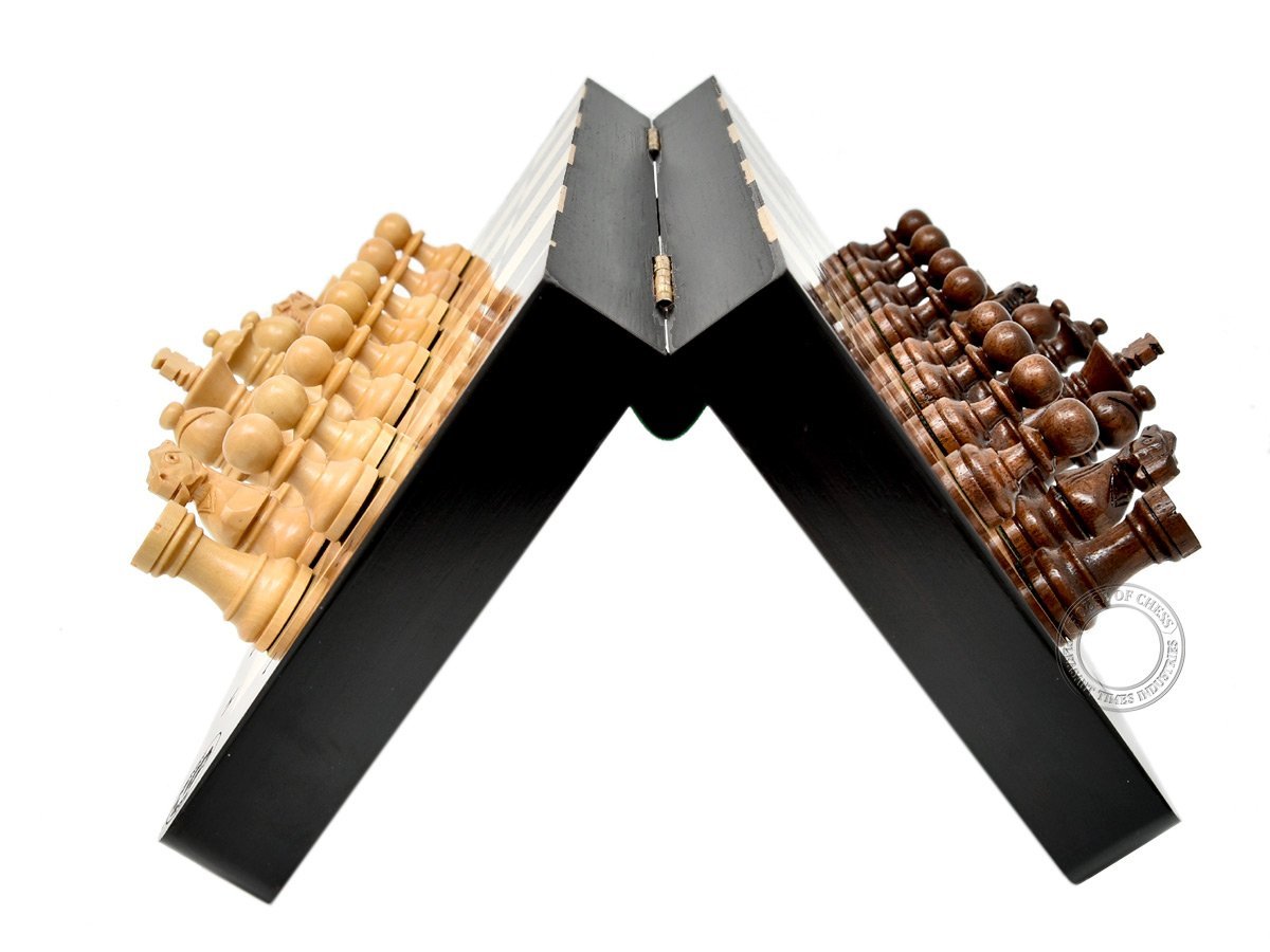 Half folded view of magnetic chess board with pieces attached