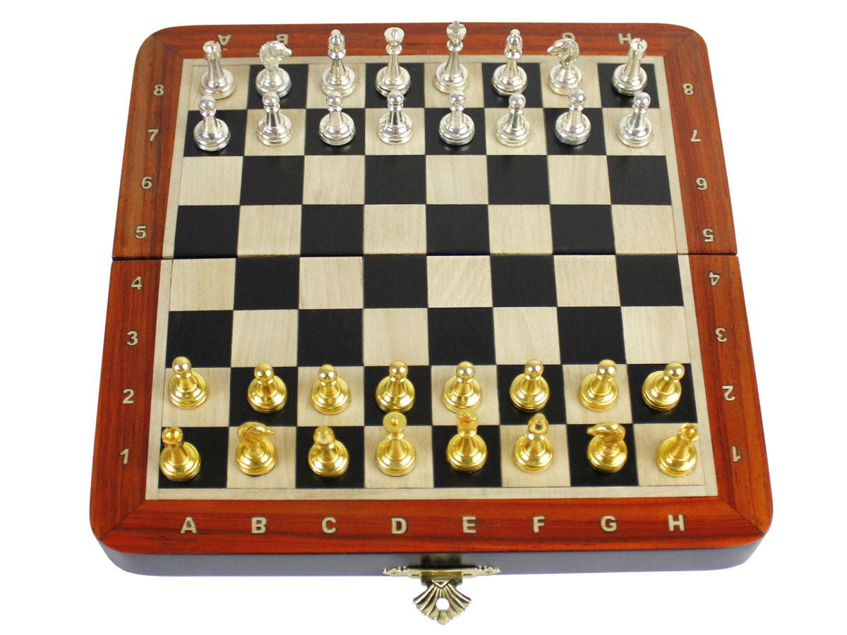 Flat layout of chess board with metal pieces on top