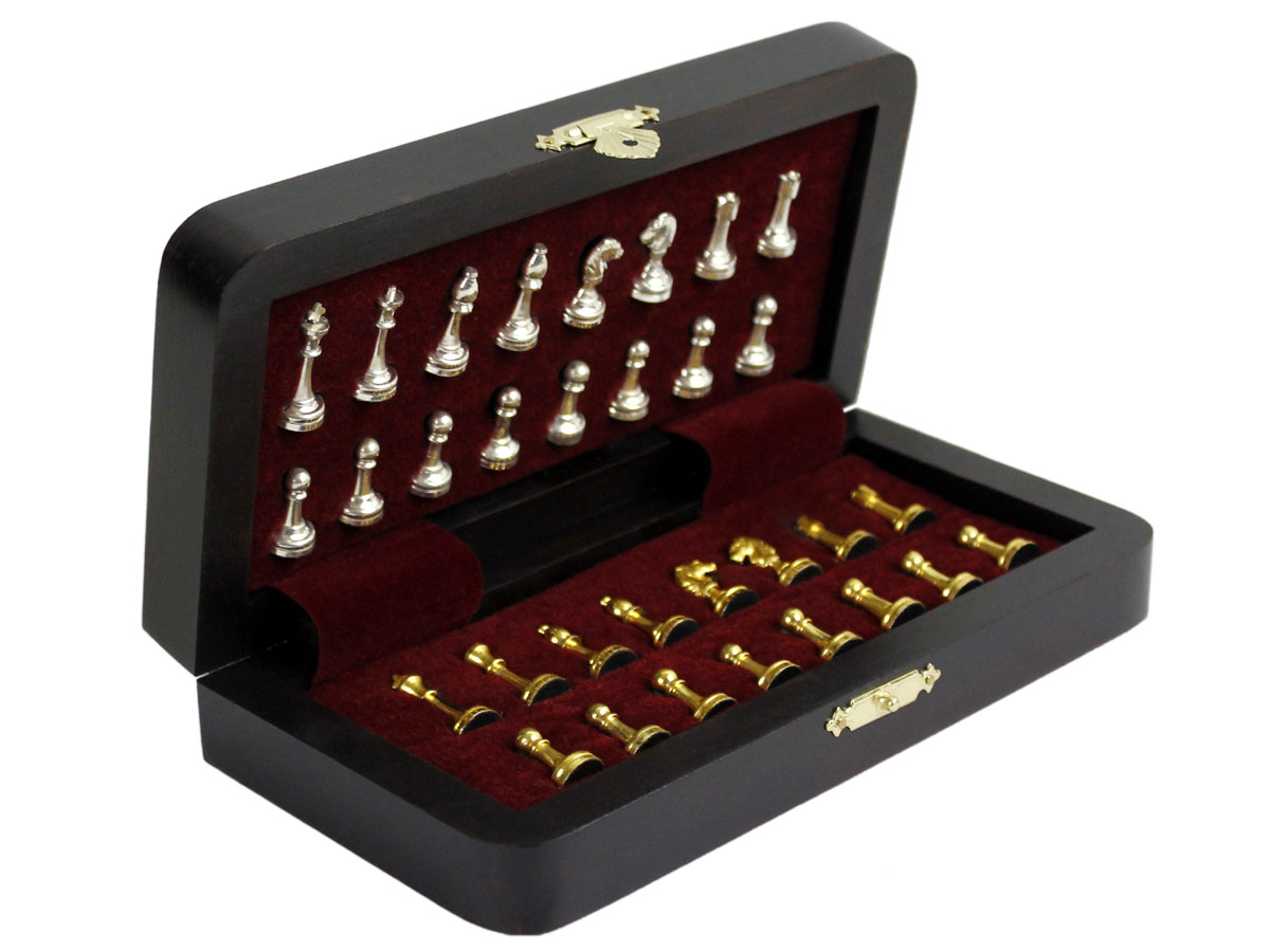Inner view of chess box with pieces inside tray
