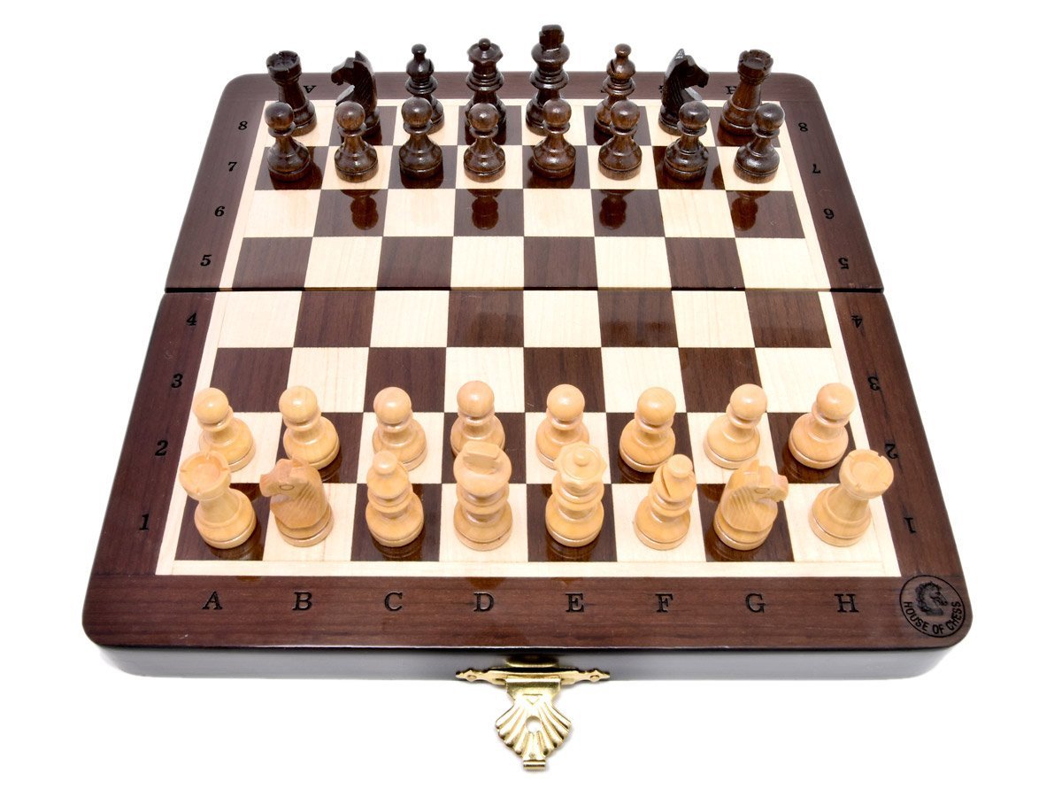 Flat layout of chess board with pieces on top