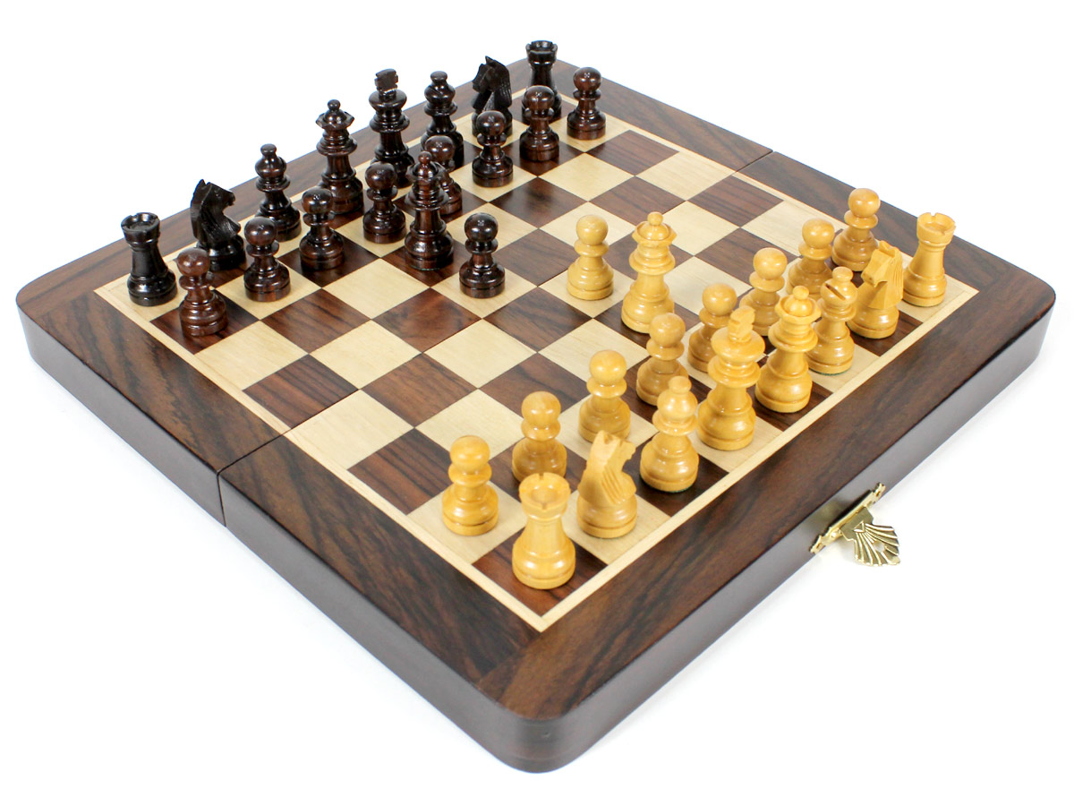 Flat layout of chess board with pieces on top