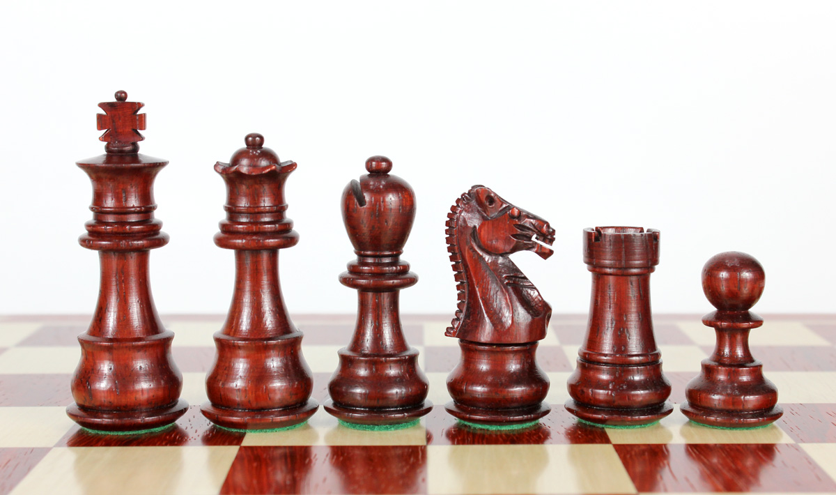 Beautiful Bud Rosewood chess pieces with beveled bases.