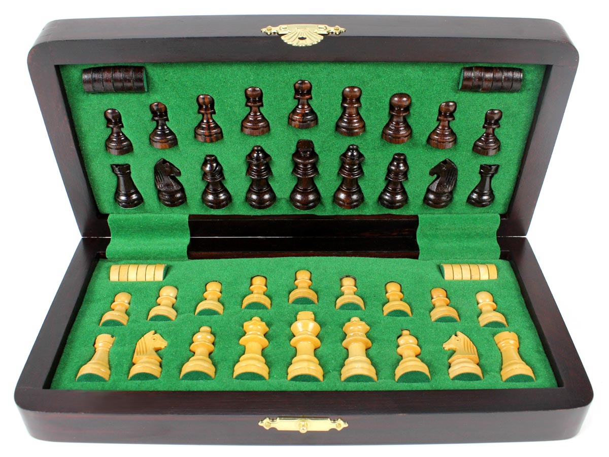 Inner view of chess box with pieces and checkers inserted