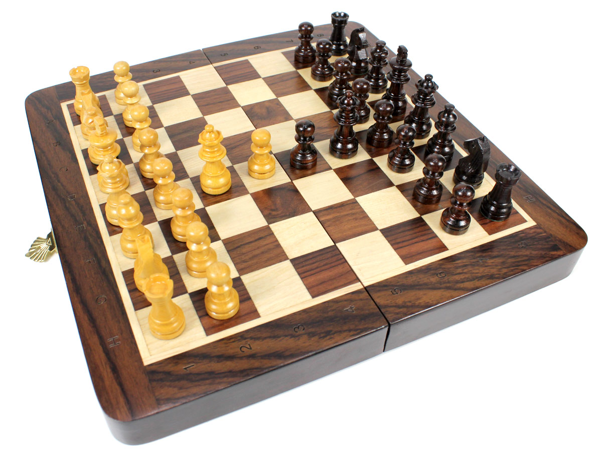 Flat layout of chess board with pieces on top