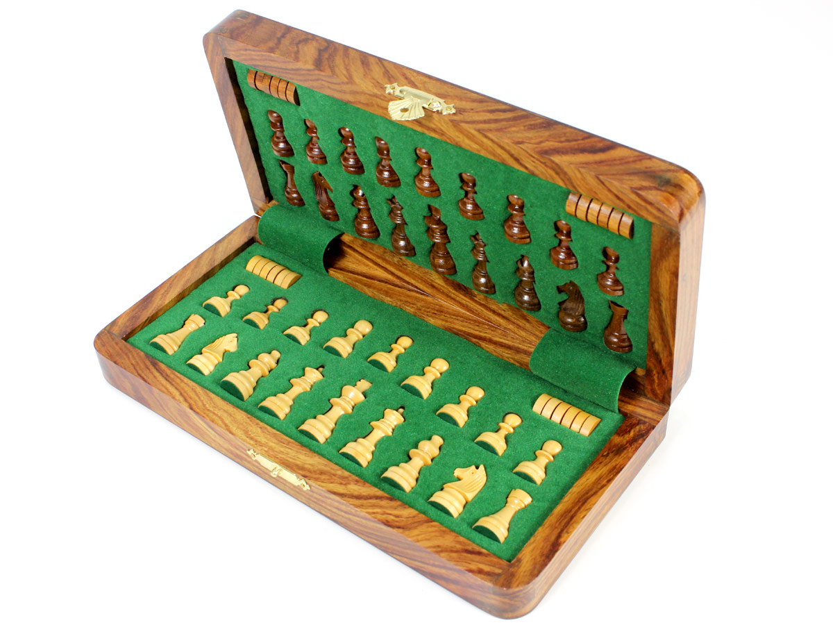 Inner view of chess box with pieces and checkers inserted