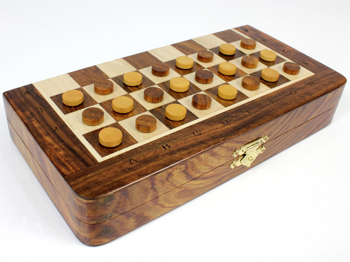 Front view of half folded chess board with checkers