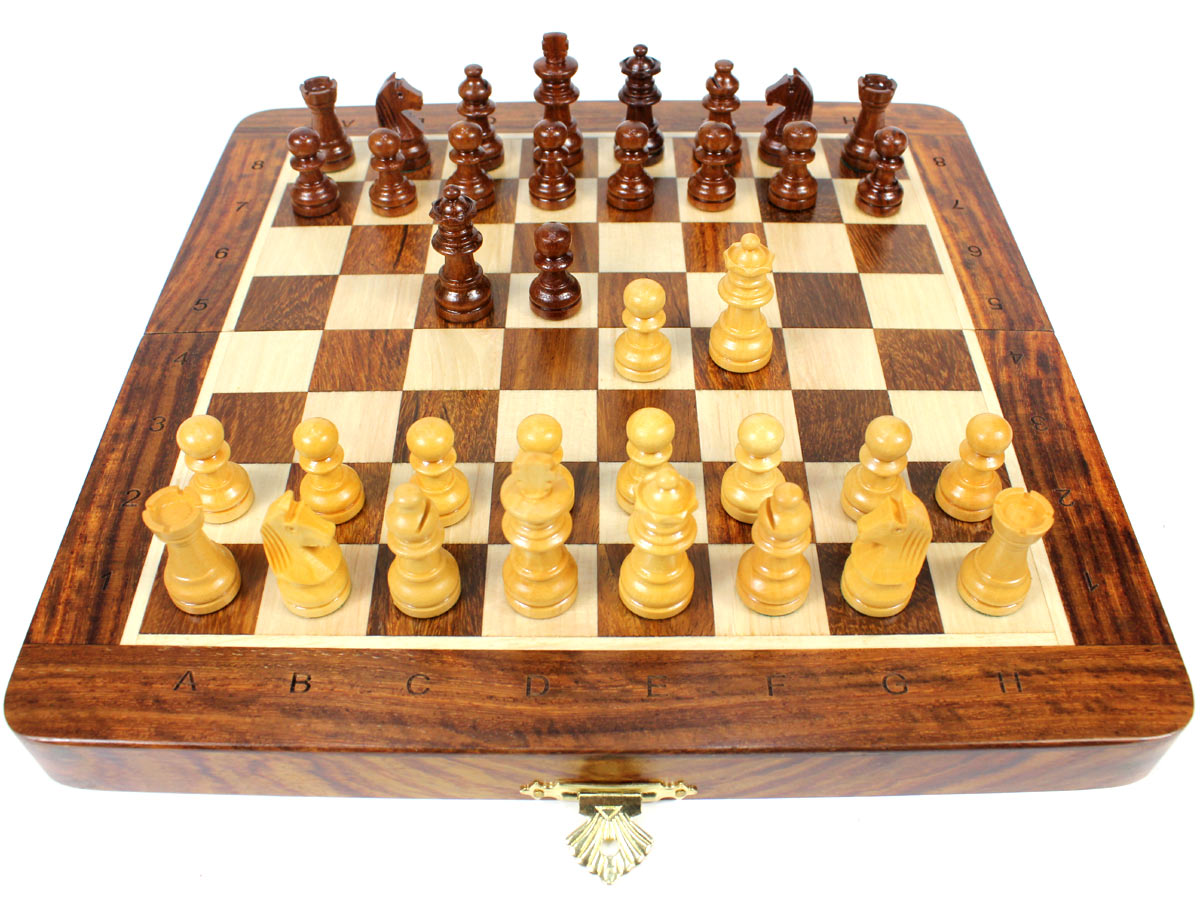 Flat layout of chess board with pieces on top