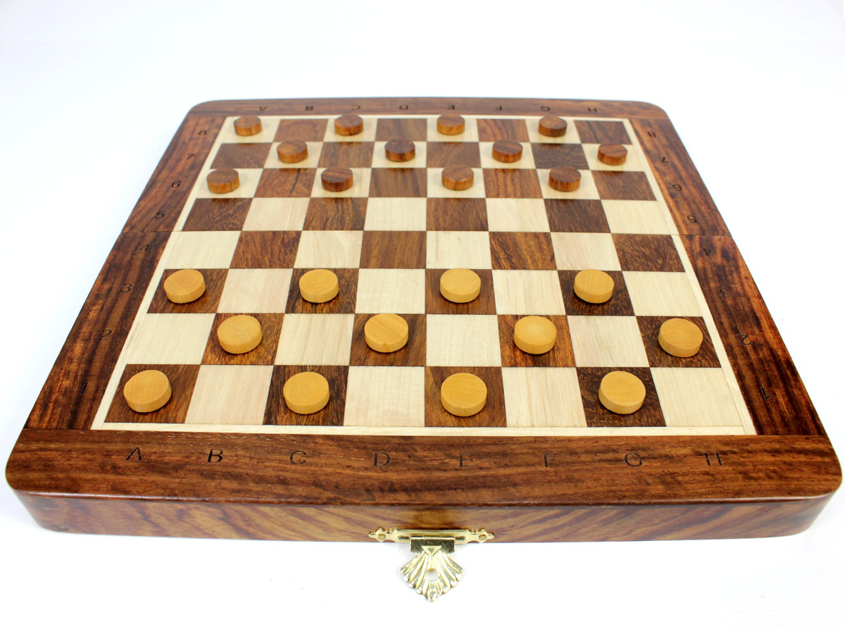Flat layout of chess board with wooden checkers on top