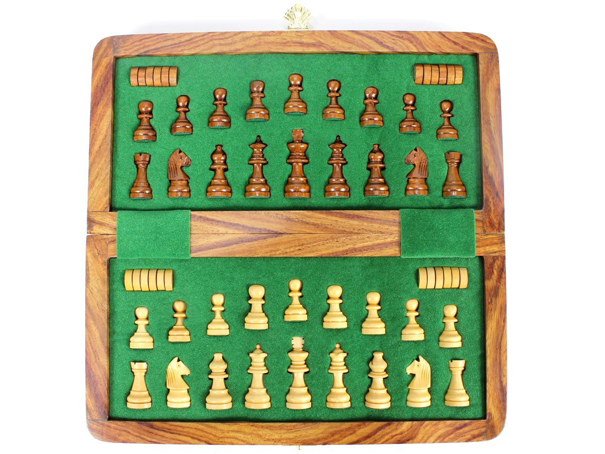 Inner view of chess box with pieces and checkers inserted