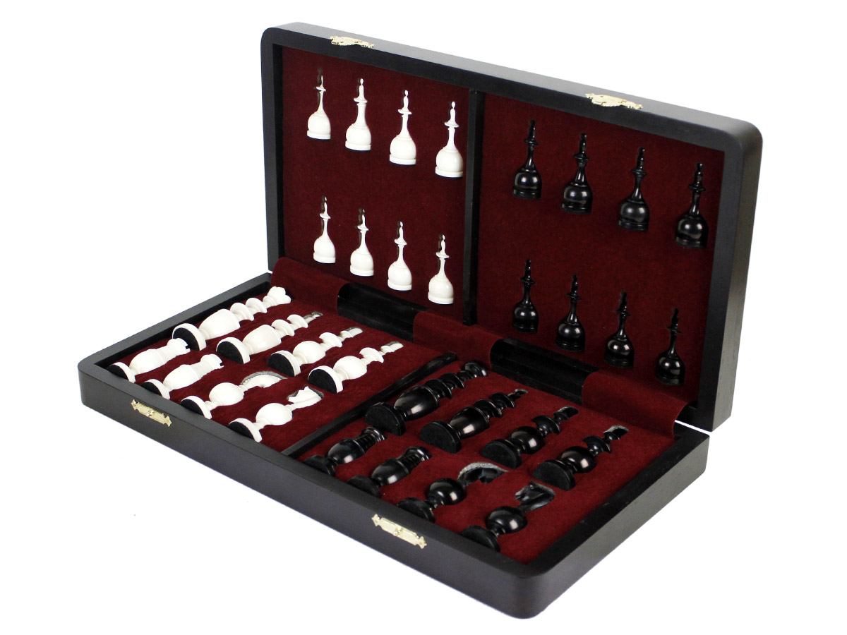 Inner view of chess box with pieces inside tray