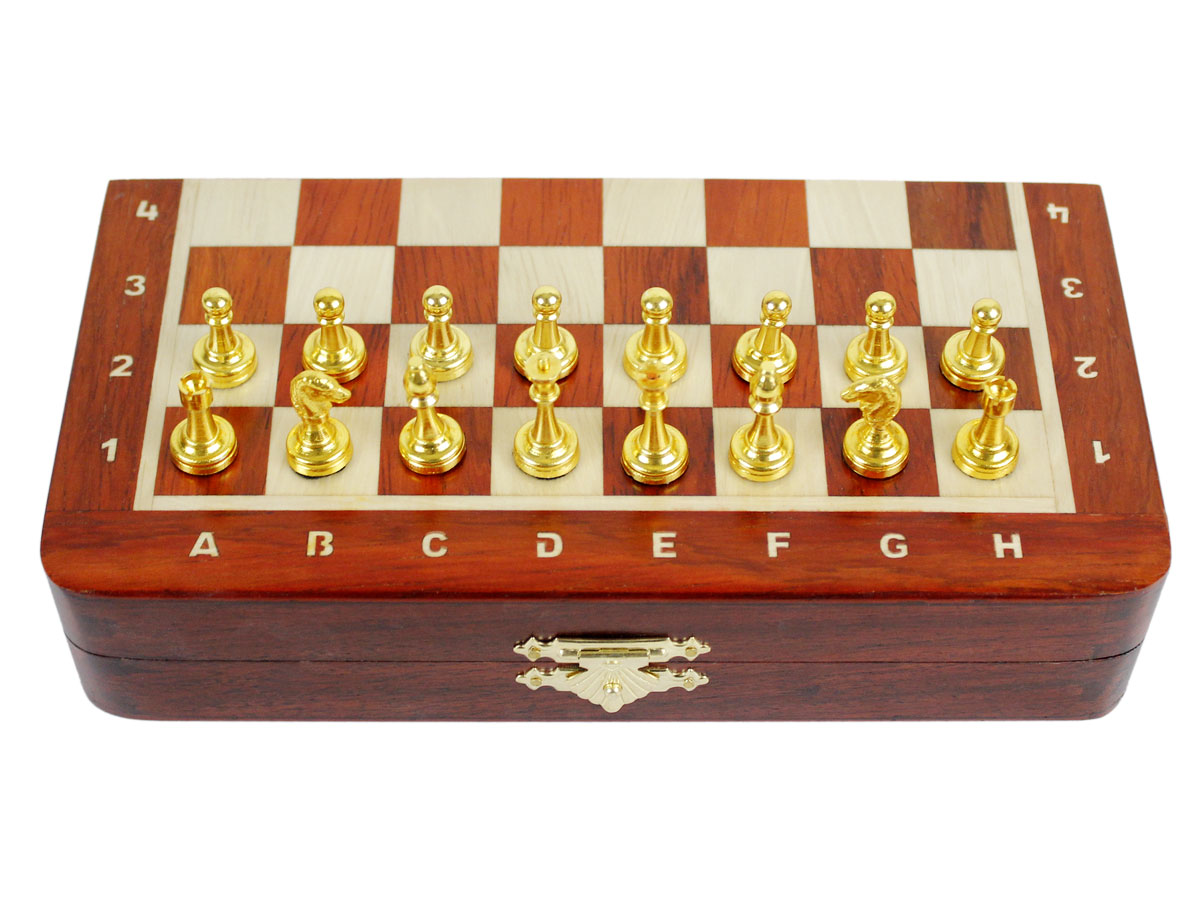 Front view of closed chess board / box with metal pieces
