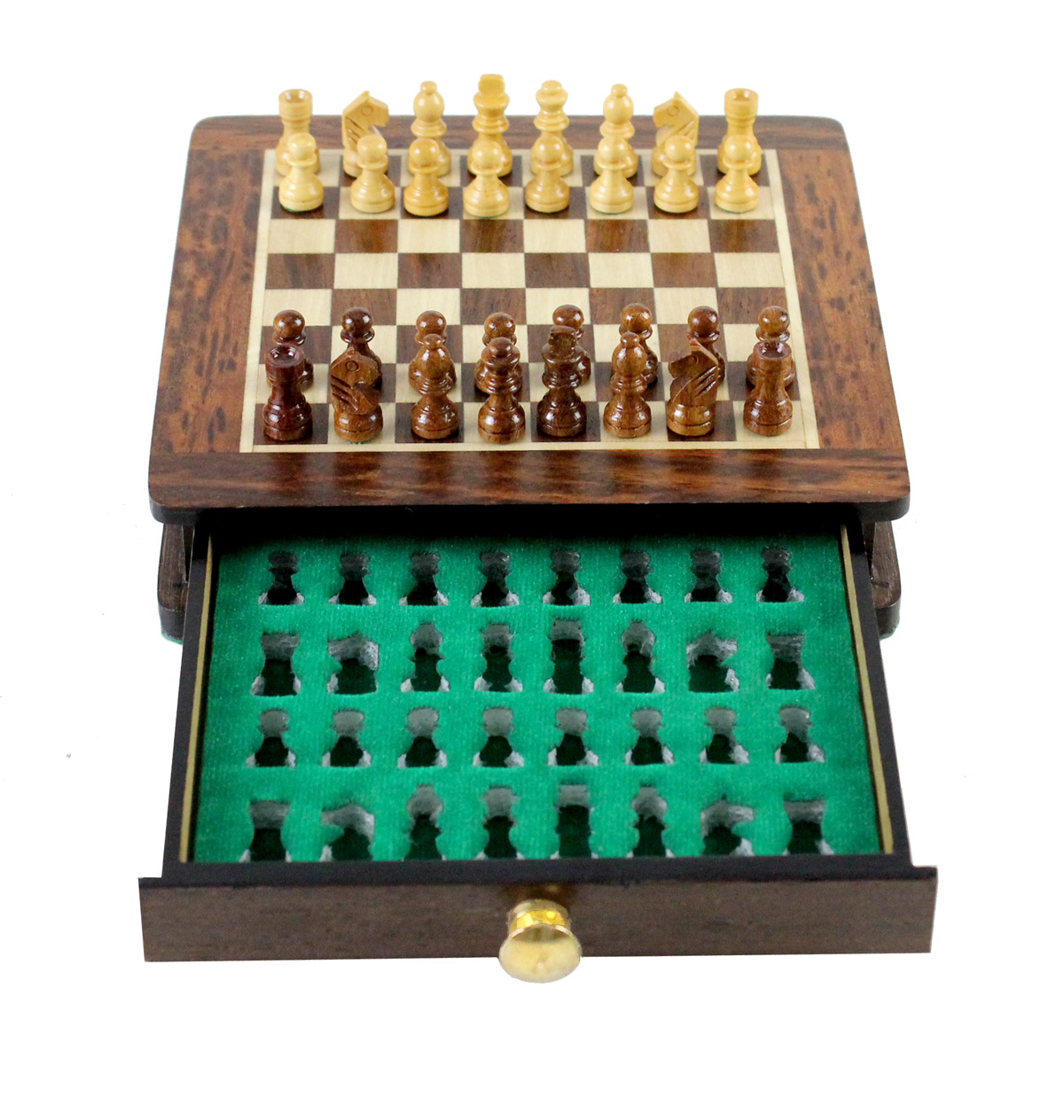 Chess pieces placed in foam cut outs inside the drawer